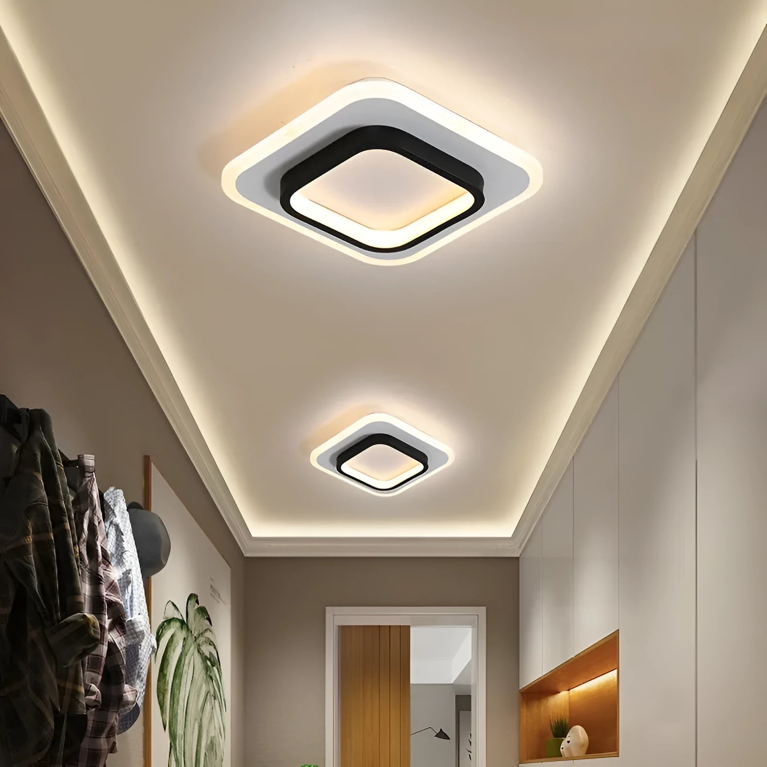 Aluminium and acrylic LED corridor light for aisles and balconies, black and white finish, circular warm light variant