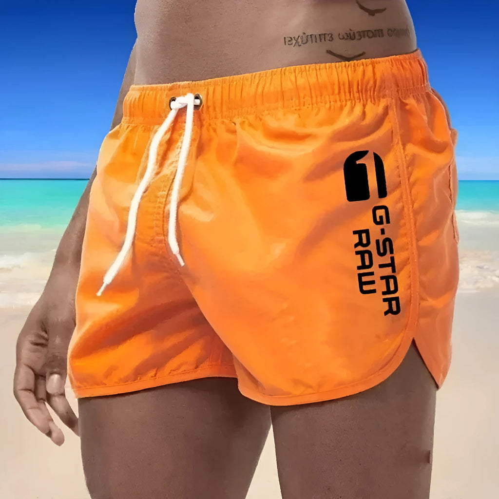 Men's polyester beach shorts with elastic waistband in multiple colour options