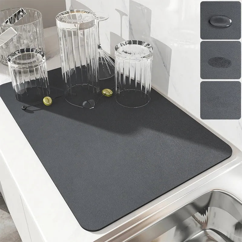 Black square absorbent drain pad mat with PU leather surface on a kitchen countertop