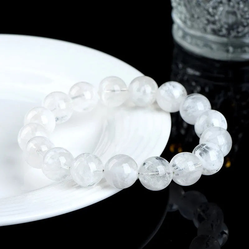 Women's crystal bracelet with round blizzard snowflake pattern beads, showing geometric and traditional design.