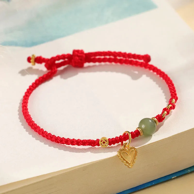 Handmade 925 silver bracelet with Hetian jade stone in woven design, available in red or dark red strap options
