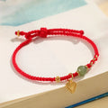 Handmade 925 silver bracelet with Hetian jade stone in woven design, available in red or dark red strap options