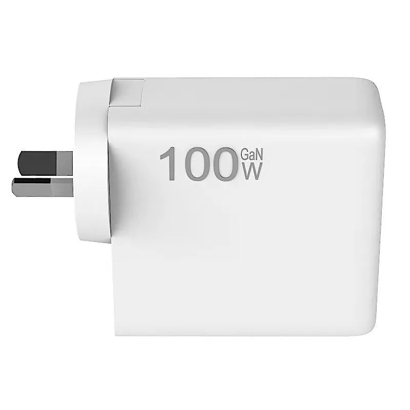 White gallium nitride fast charger 100W with Type-C and USB ports, compact size, interchangeable plugs
