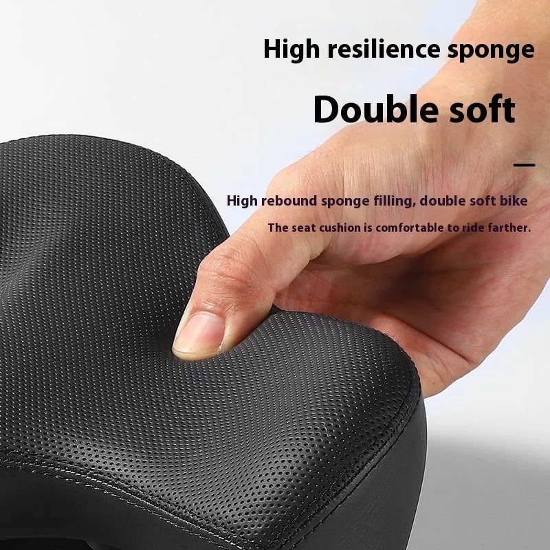 Black leather bicycle seat cushion with thick polyurethane foam padding.