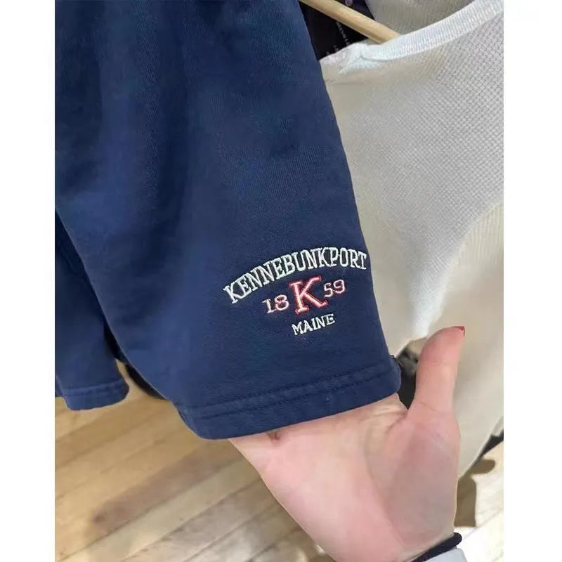 Women's dark blue cotton high top sports shorts with white flag embroidery and adjustable side ties