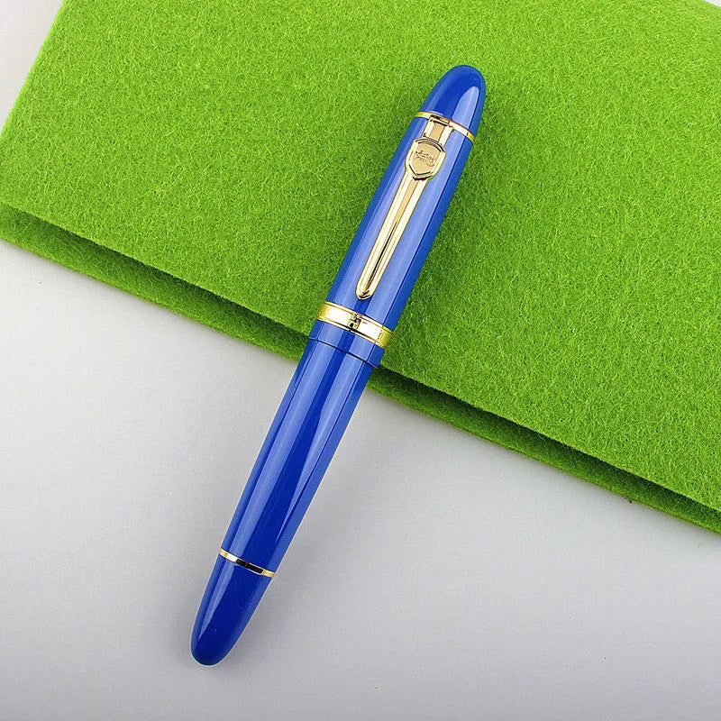 Metal ball pen with pearl round beads and black gold clip on white background
