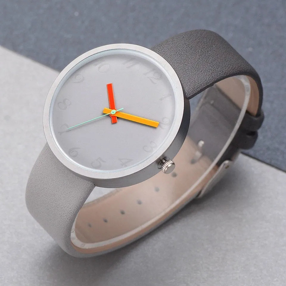 Women's grey contrast PU strap quartz watch with 40mm alloy case, pin buckle, and ordinary glass mirror