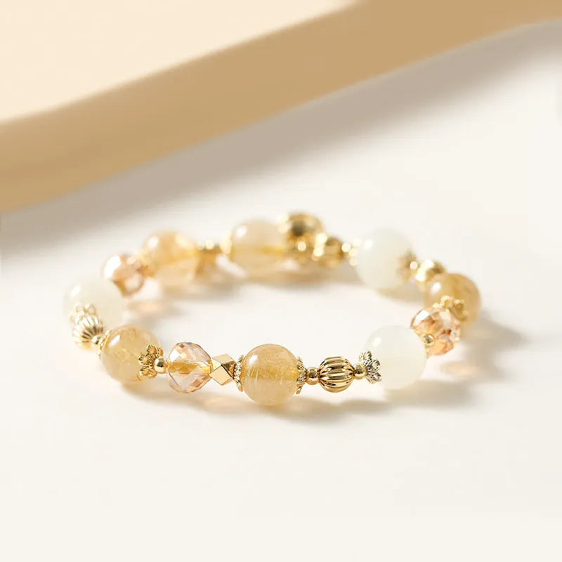Korean style gold crystal bracelet with rutilated quartz stones and electroplated finish.