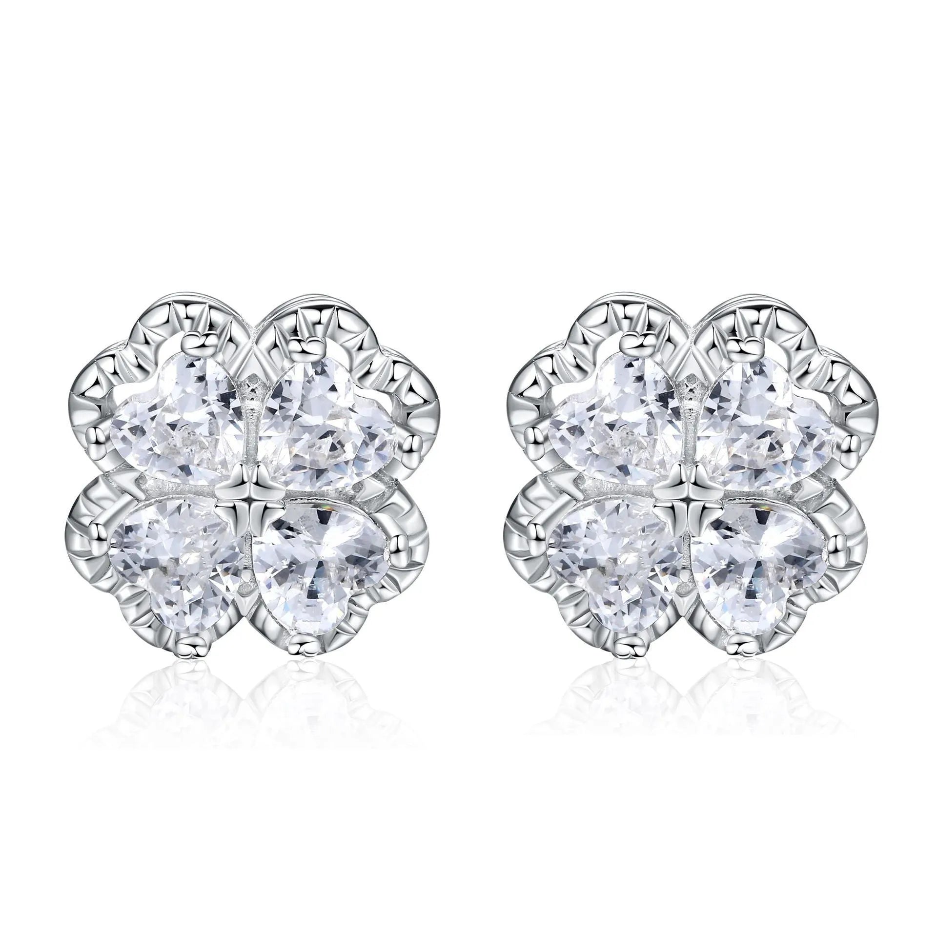 Close-up of women's heart-shaped zircon earrings in 925 silver with a white gold colour finish.