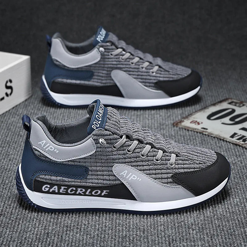 Men's green and grey mesh running shoes with low-top design and lace-up closure