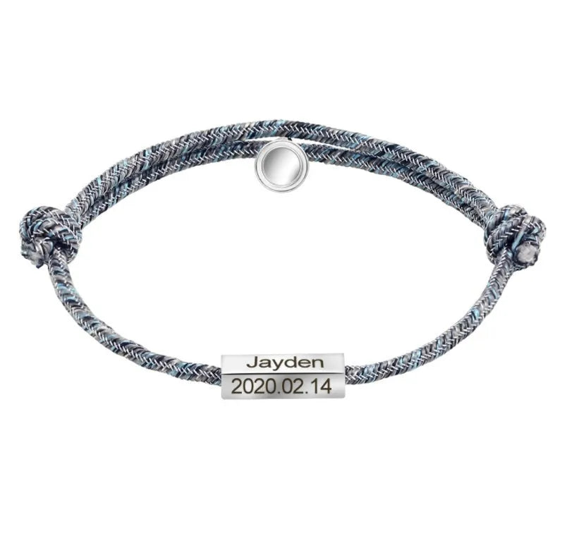 Pair of stainless steel magnetic bracelets for couples, silver and rose gold finish, with adjustable hand rope