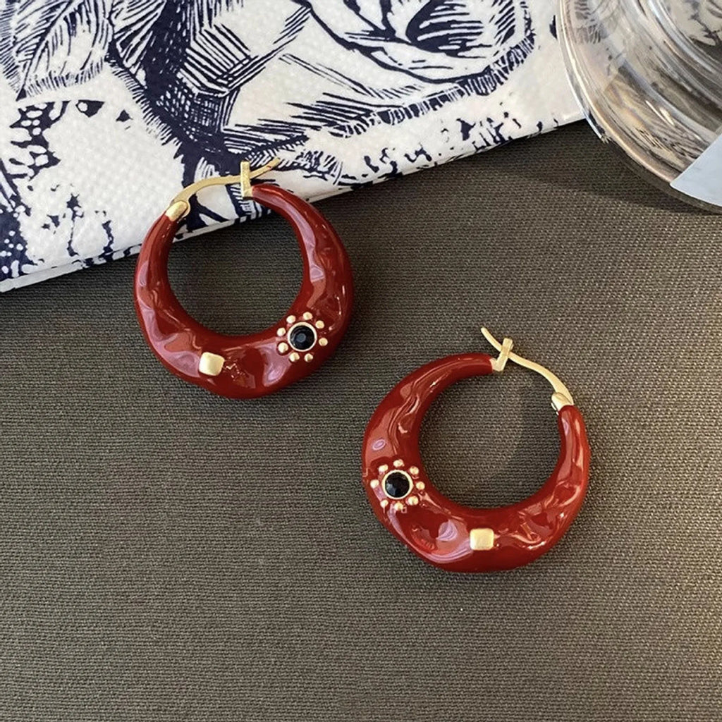Hong Kong style retro ear studs with rhinestone inlay and dripping oil texture in black and red colours