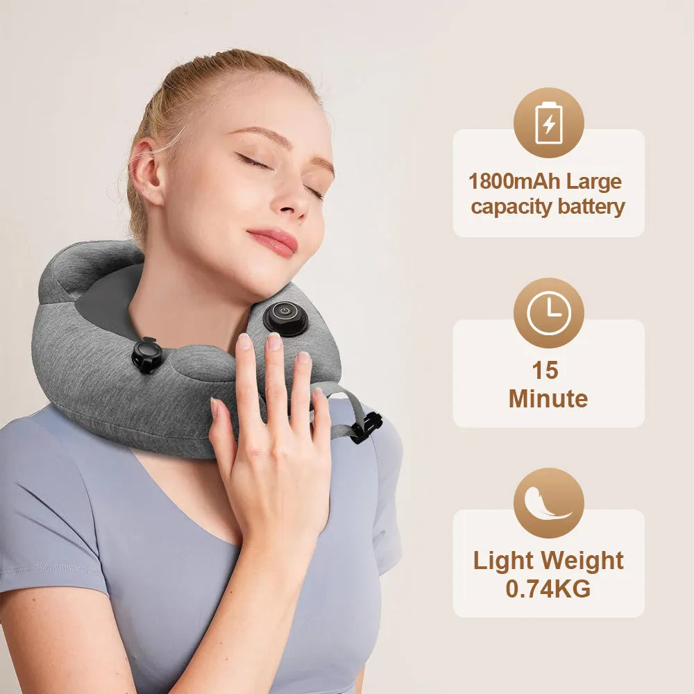 Gray inflatable U shape neck massager pillow with kneading 3 modes, deflated on a table with carry bag and USB cable