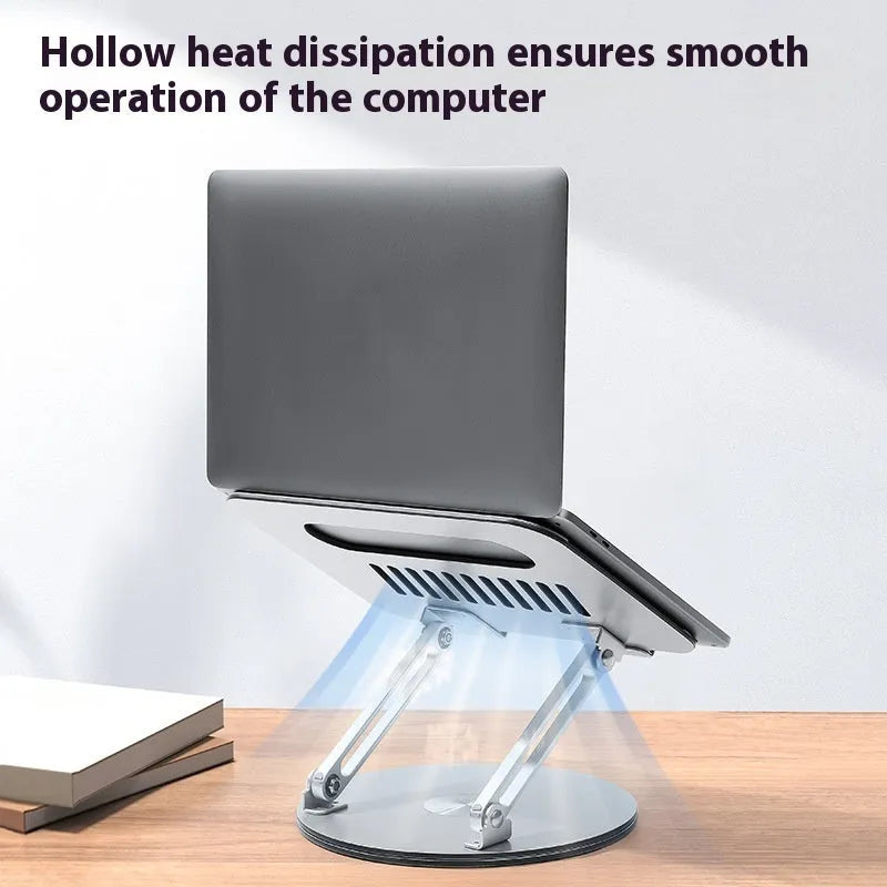 Silver aluminium alloy foldable and rotatable laptop stand on a desk