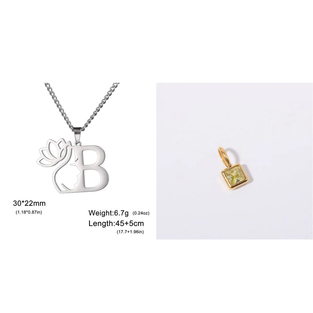 Stainless steel personalised letter necklace with gold finish on a 5mm wide cross chain, showing separate initial pendant.