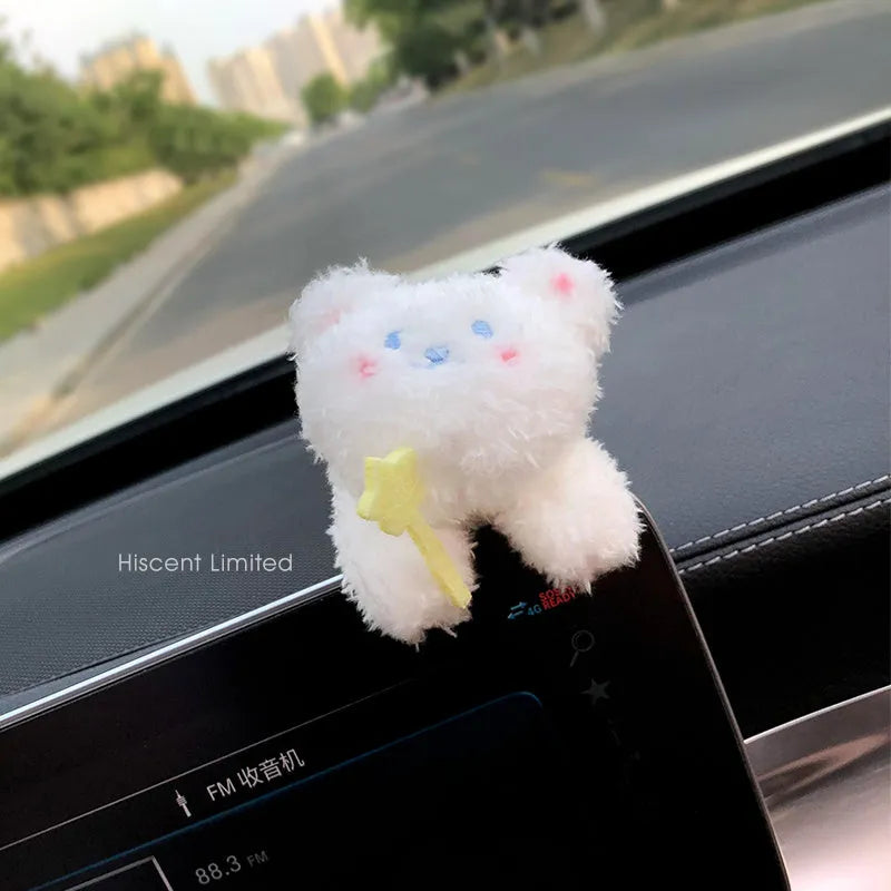 Cute cotton car decoration doll showing a pilot dog design on a dashboard.