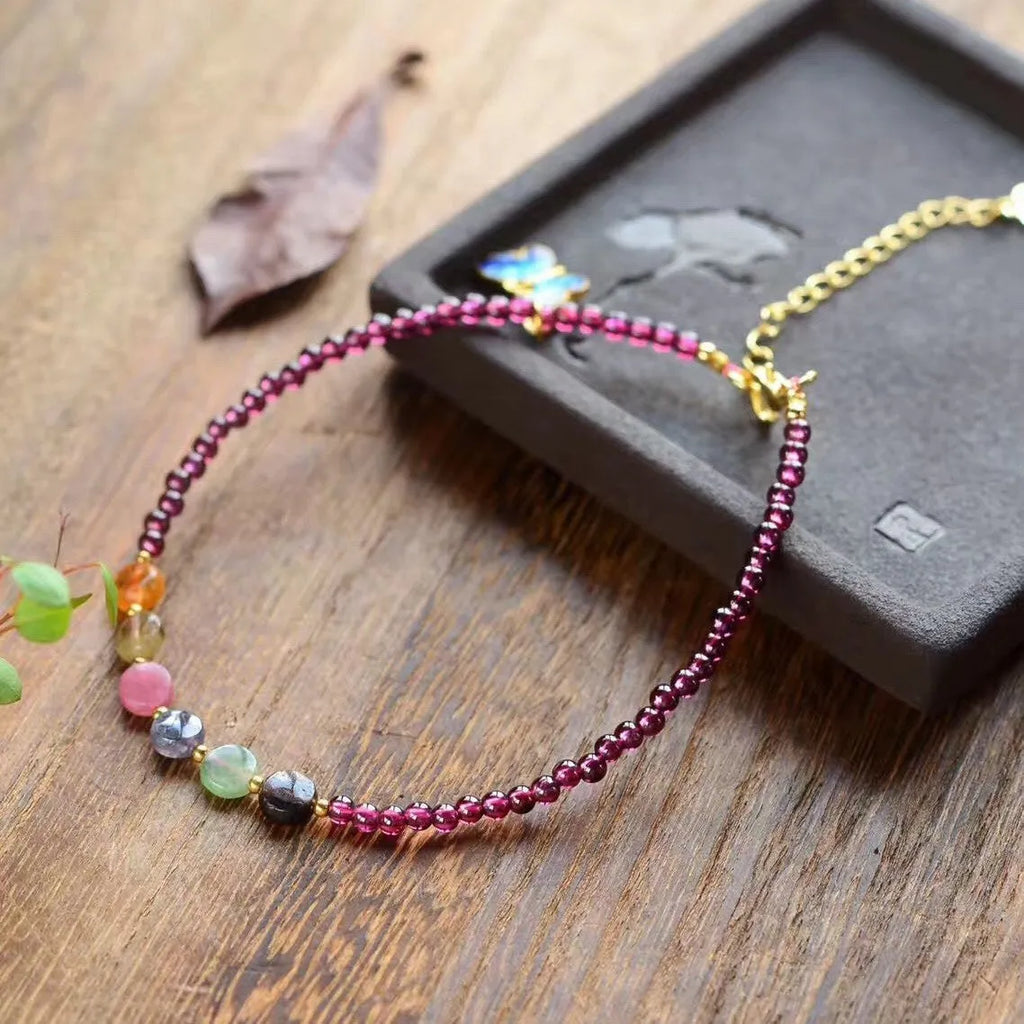 Purple garnet anklet with geometric beads in ethnic design for women