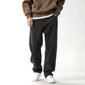 Men's loose fit plus size jeans in black and gray denim, mid waist, sizes 28-42