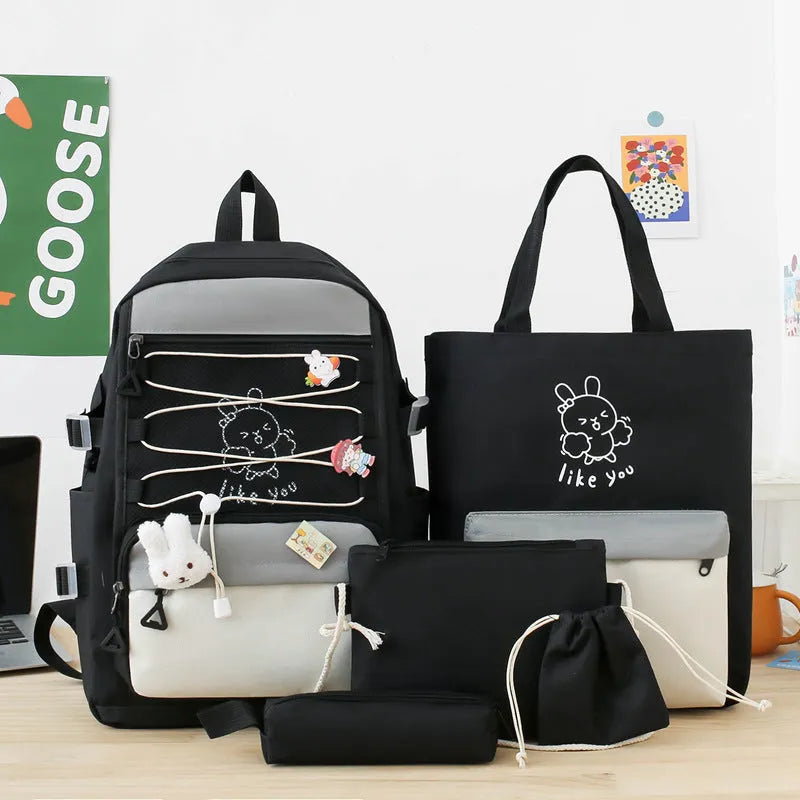 Nylon student backpack in four colour options with curved shoulder straps for junior high school