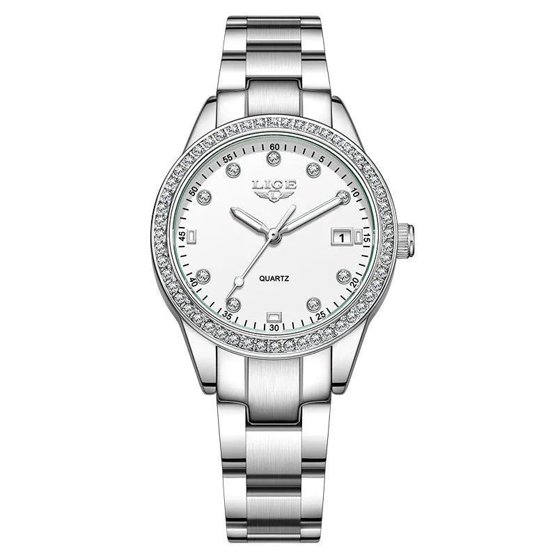 Silver fashion quartz watch with diamond bezel and 34mm stainless steel case on wrist.