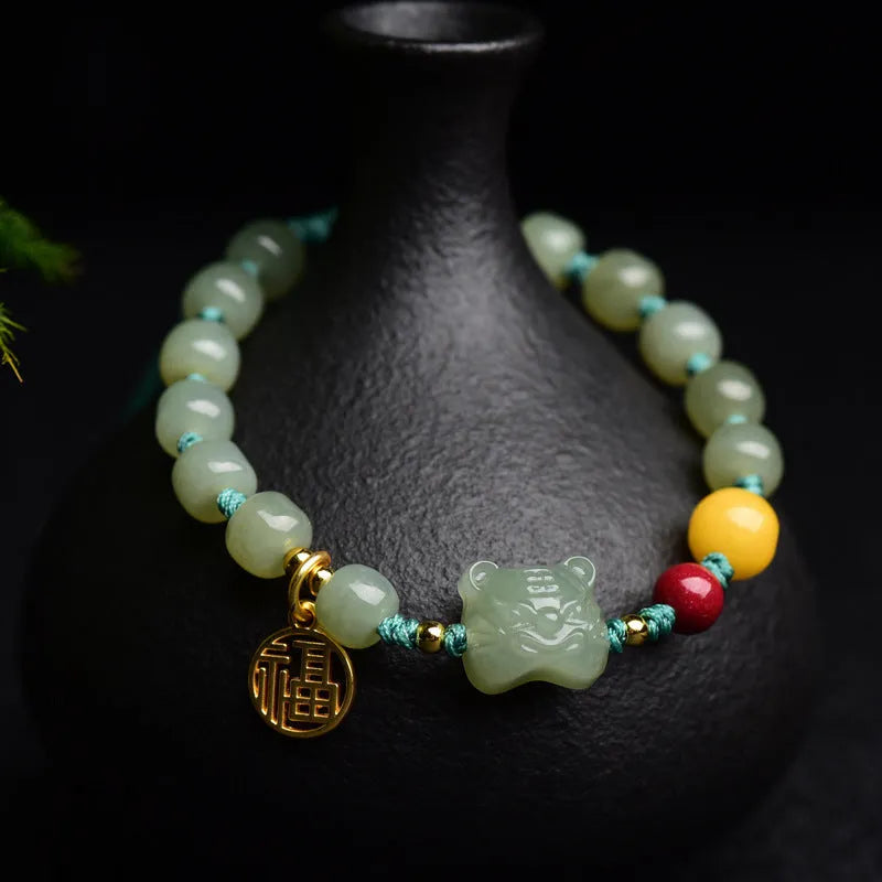 Natural Hetian jade bracelet with animal zodiac modelling and 5x7mm beads