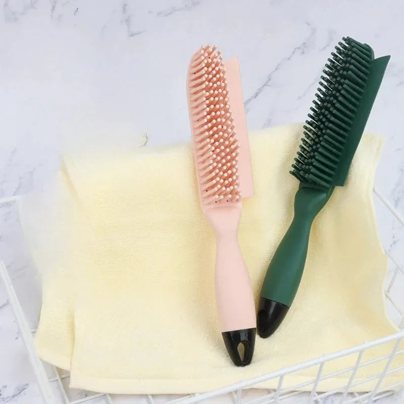 Green silicone pet hair remover brush with plastic handle on a fabric sofa