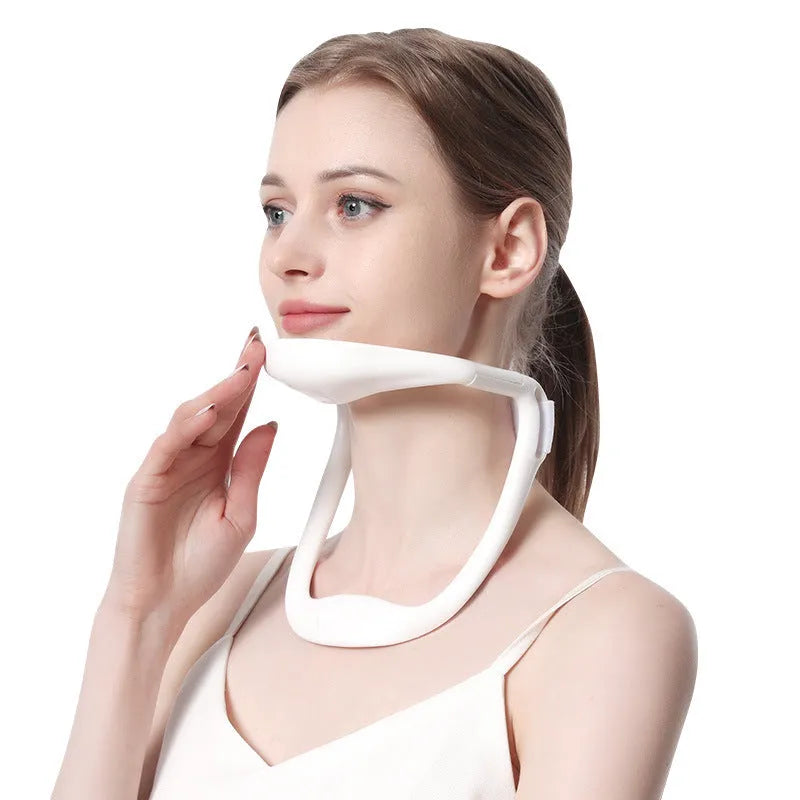 White adjustable neck brace for cervical spine support and posture correction.