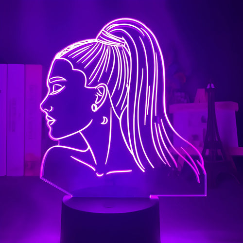 Slim European style acrylic 3D LED night light with colourful illumination on a black base.