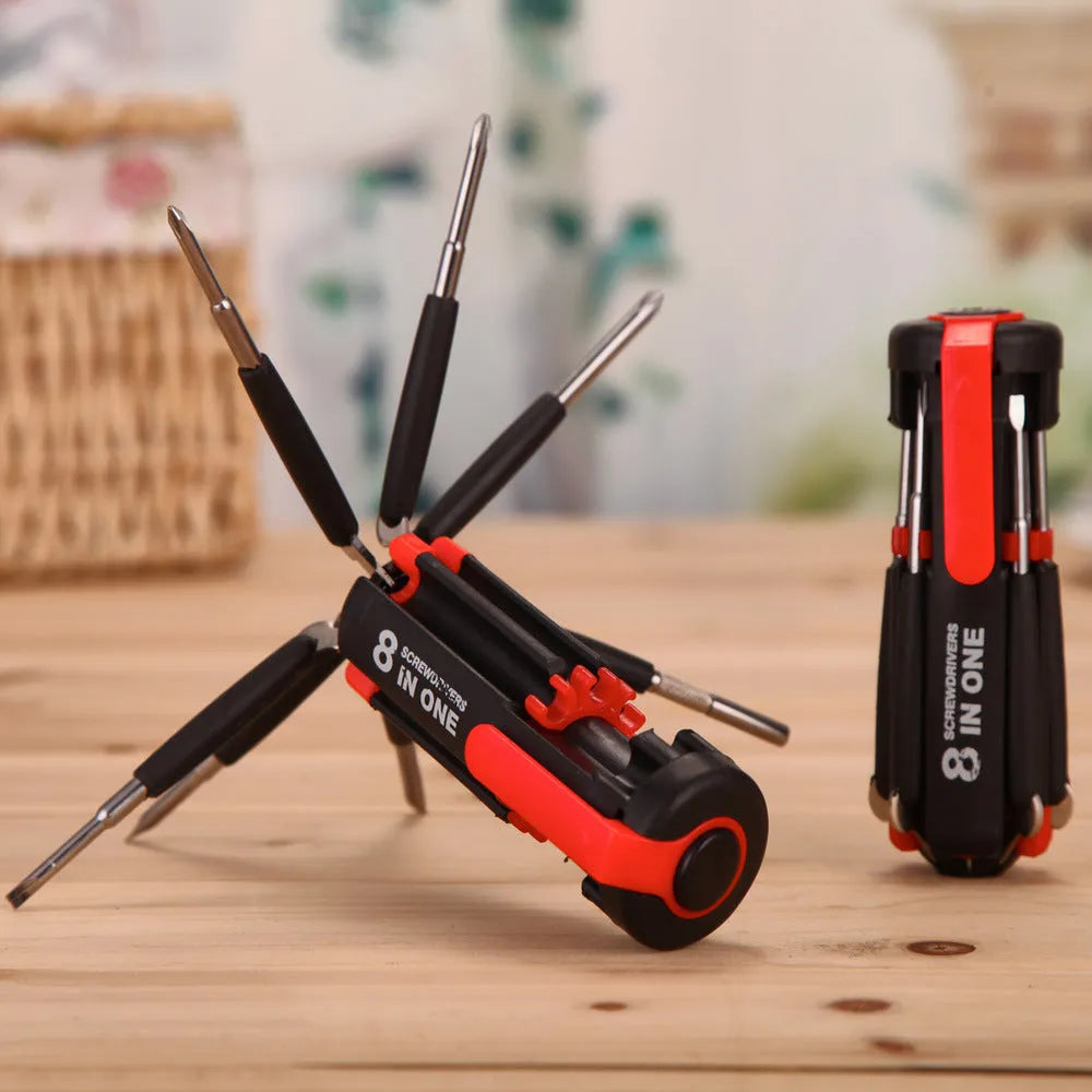 8-in-1 screwdriver with LED flashlight, magnetic bits, and stainless steel body on a workbench