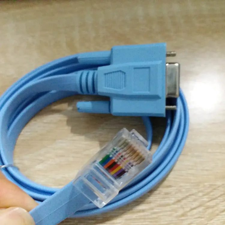 Sky-blue flat RJ45 to DB9 serial console cable with copper conductors, 1.5 metres long