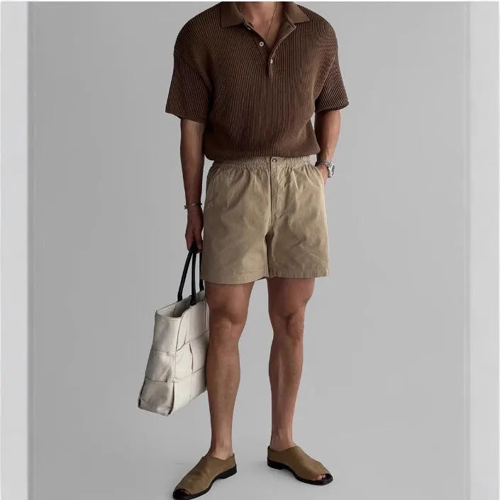 Men's cotton loose fit sports shorts in black, white, and khaki colours for summer athletic wear