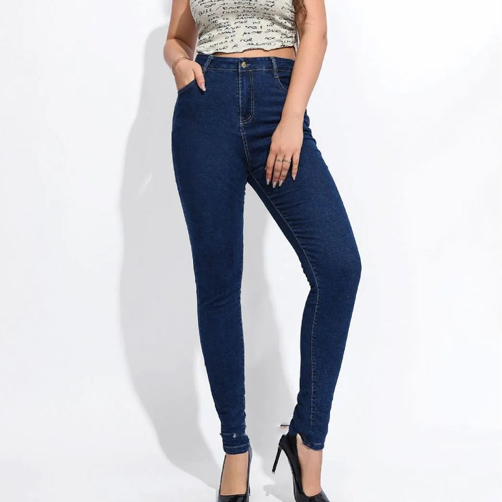 High waist stretch denim skinny jeans in blue with pocket details and pencil pants style