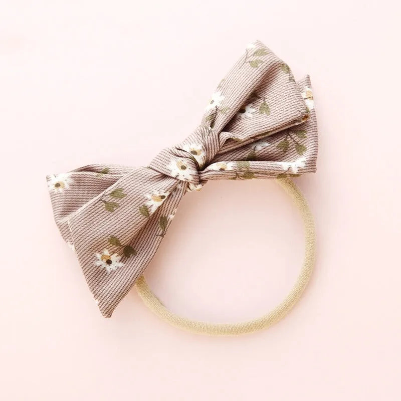 Children's knotted bow hair ring in cloth with Princess series styling
