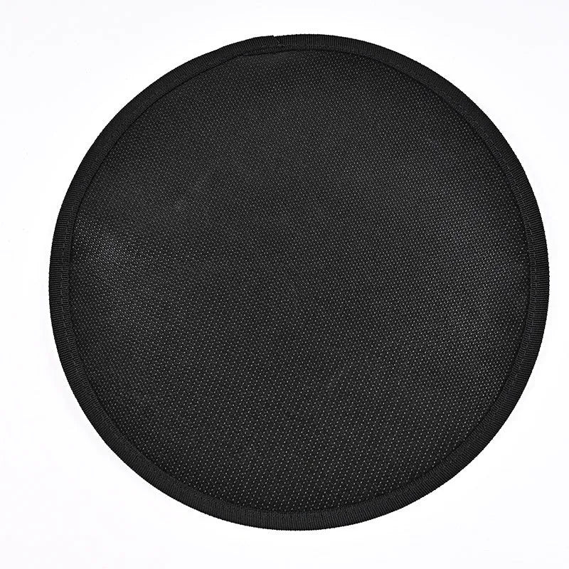 Black round fireproof barbecue mat on grass, available in 11 24 36 48 inch sizes