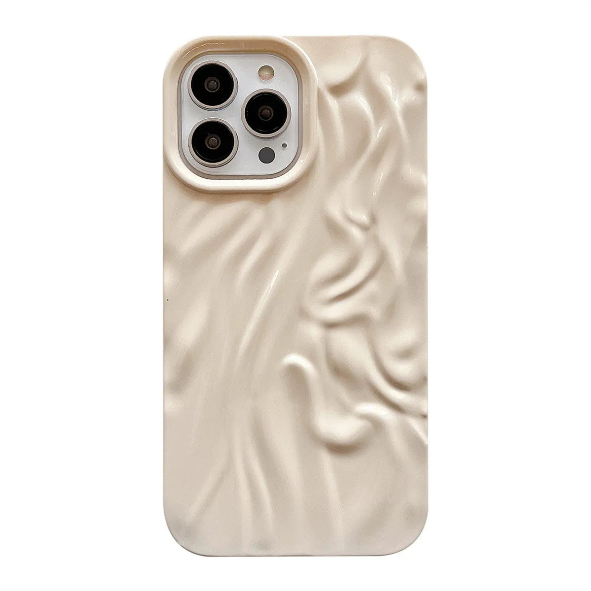 Solid colour water ripple texture silicone case for iPhone on a table.