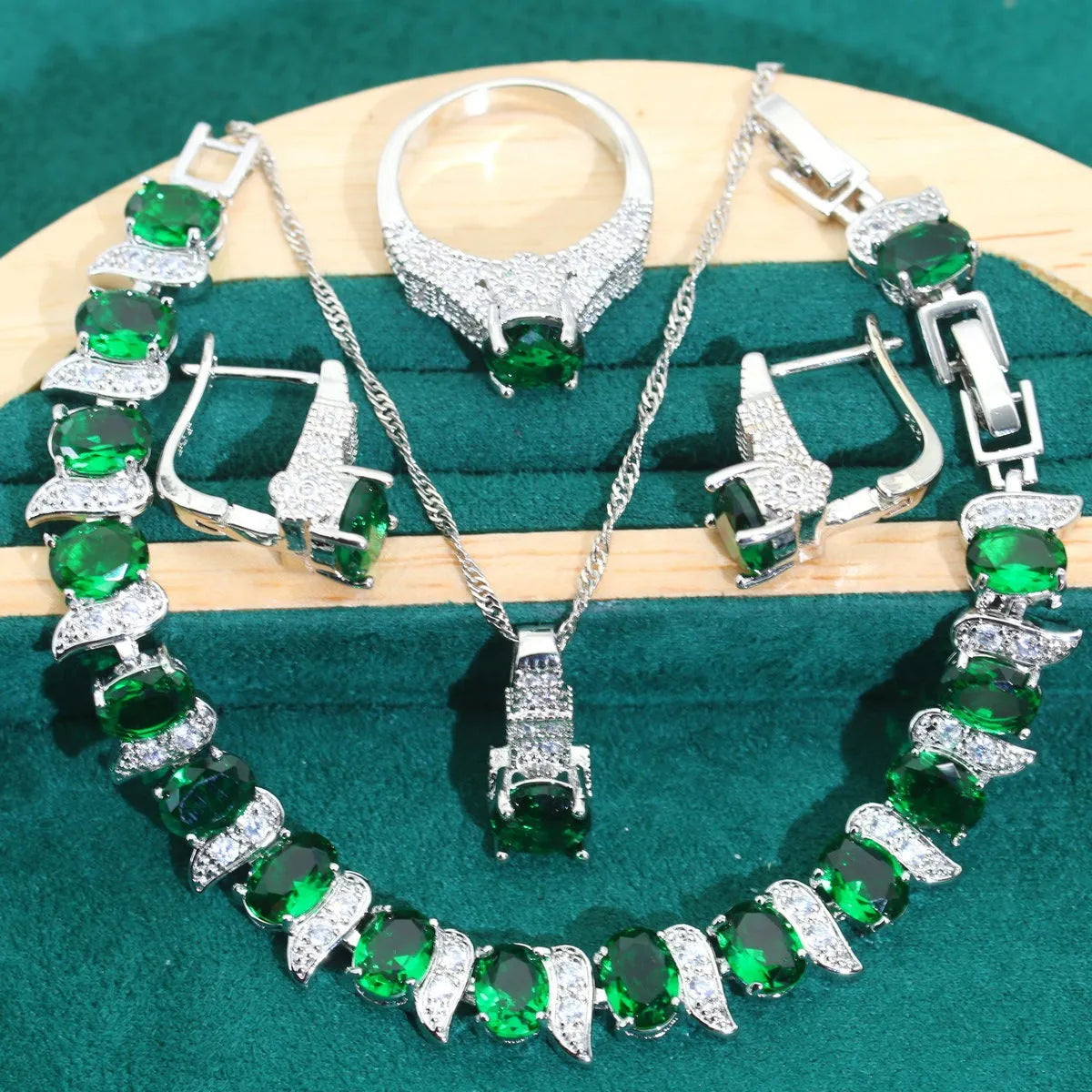 Bridal zircon necklace, bracelet, earrings, and ring four-piece jewellery set in alloy.