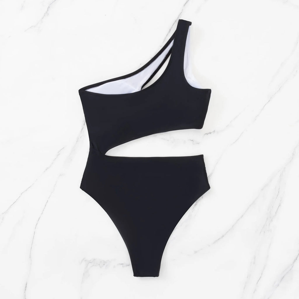 Black women's one-piece swimsuit with white contrast stitching and hollow design detail