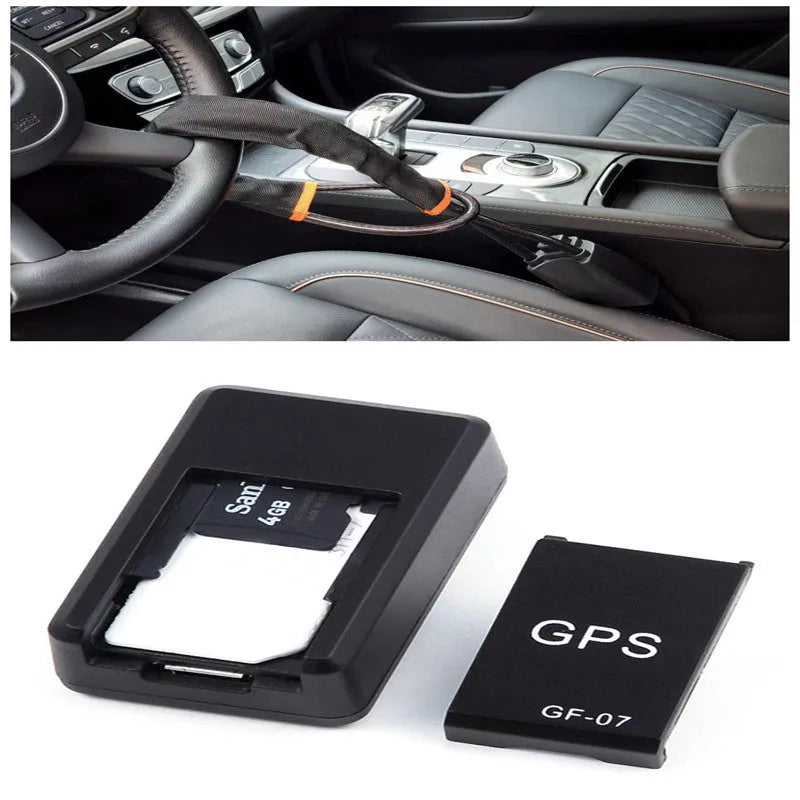 Small black magnetic GPS car tracker with USB charging cable on a metal surface.