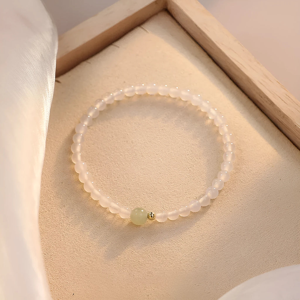 White agate women's bracelet with New Chinese style design showing polished beads and 15cm length