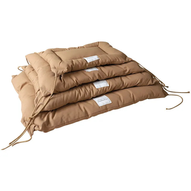Tied cage cushion pet nest in beige, coffee or orange colours showing four size options for small dogs and cats