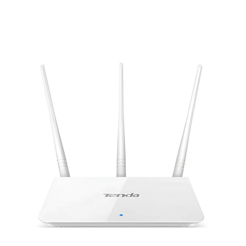 White Asus RT-AX57 Go WiFi 6 router with multiple antennas on a wooden desk