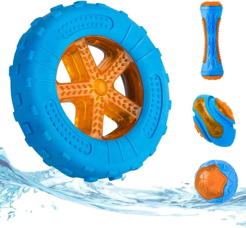 Set of four squeaky dog toys: a blue ball, a red barbell, and two orange tyres, shown on grass.
