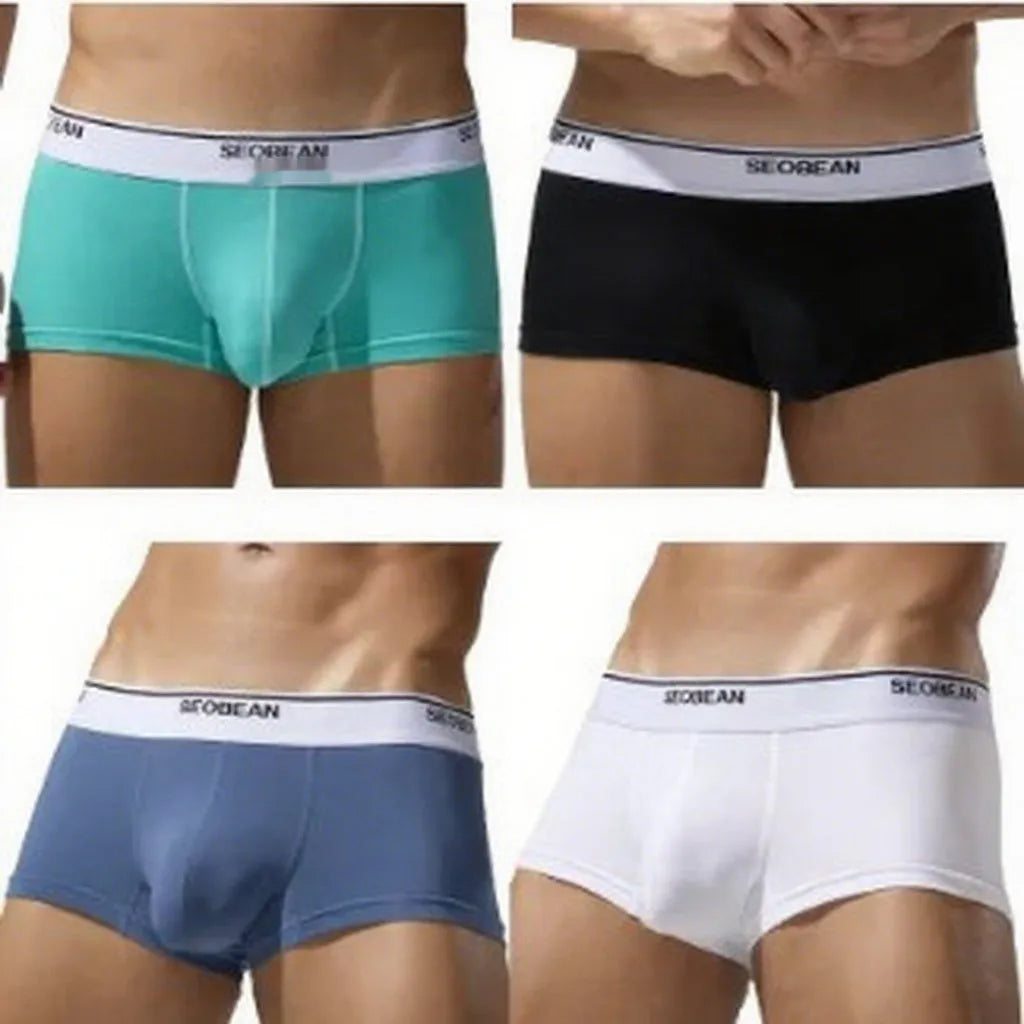 Men's low waist cotton boxer shorts in solid colours: white, blue grey, cyan or black.