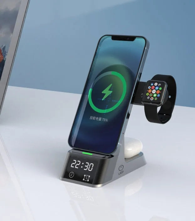 Black six-in-one multifunctional alarm clock with wireless phone charging pad and digital display.