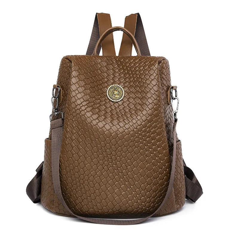 Women's black anti-theft backpack with waterproof PU material and multiple organisational compartments