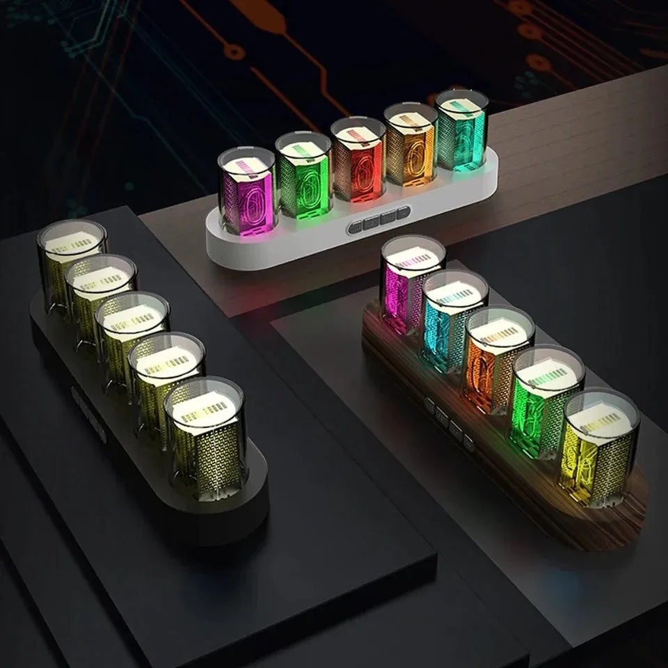 RGB Luminotron LED digital clock showing colourful display on desk with USB cable