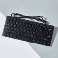 Mini USB wired keyboard in choice of black, white, pink or blue colours with compact design