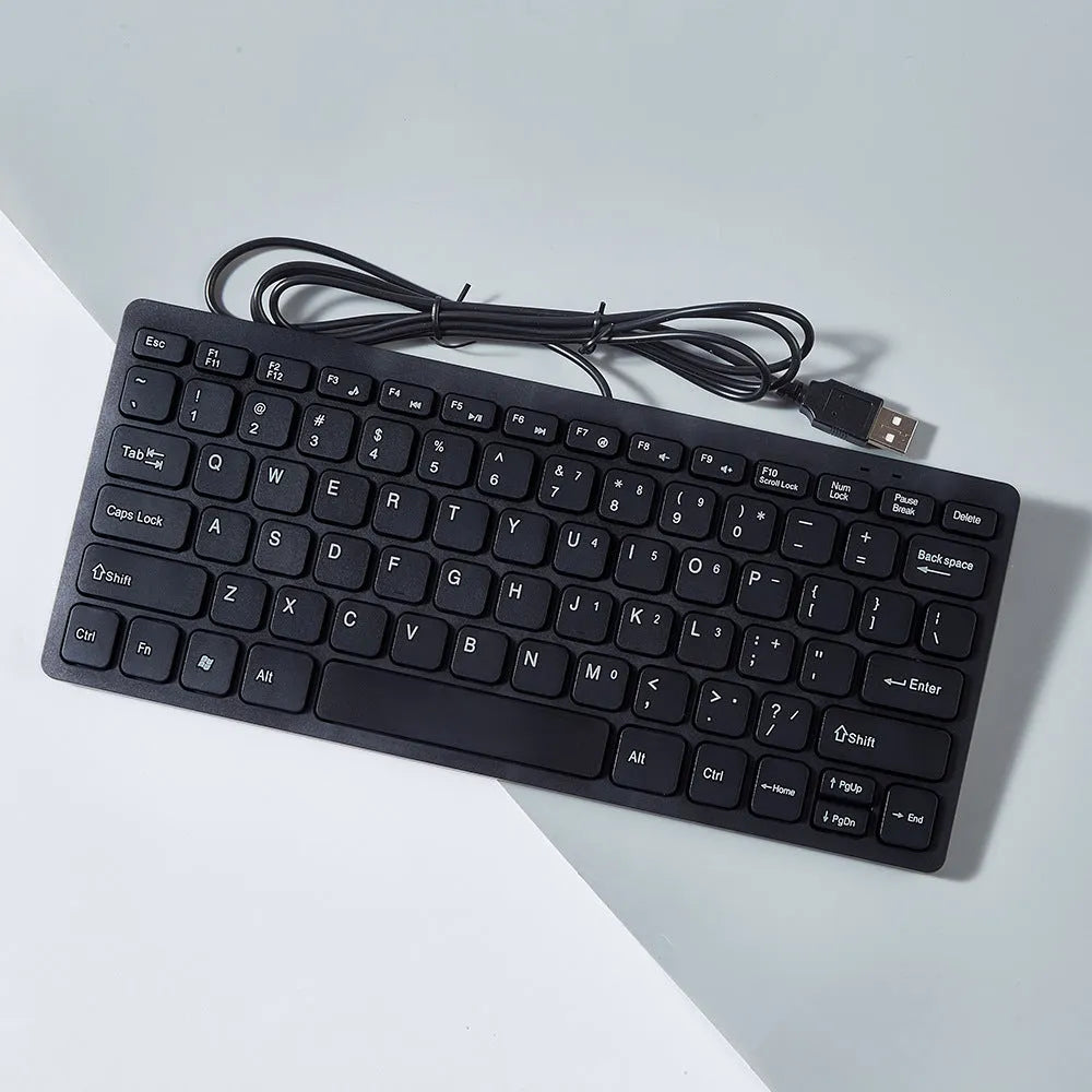 Mini USB wired keyboard in choice of black, white, pink or blue colours with compact design