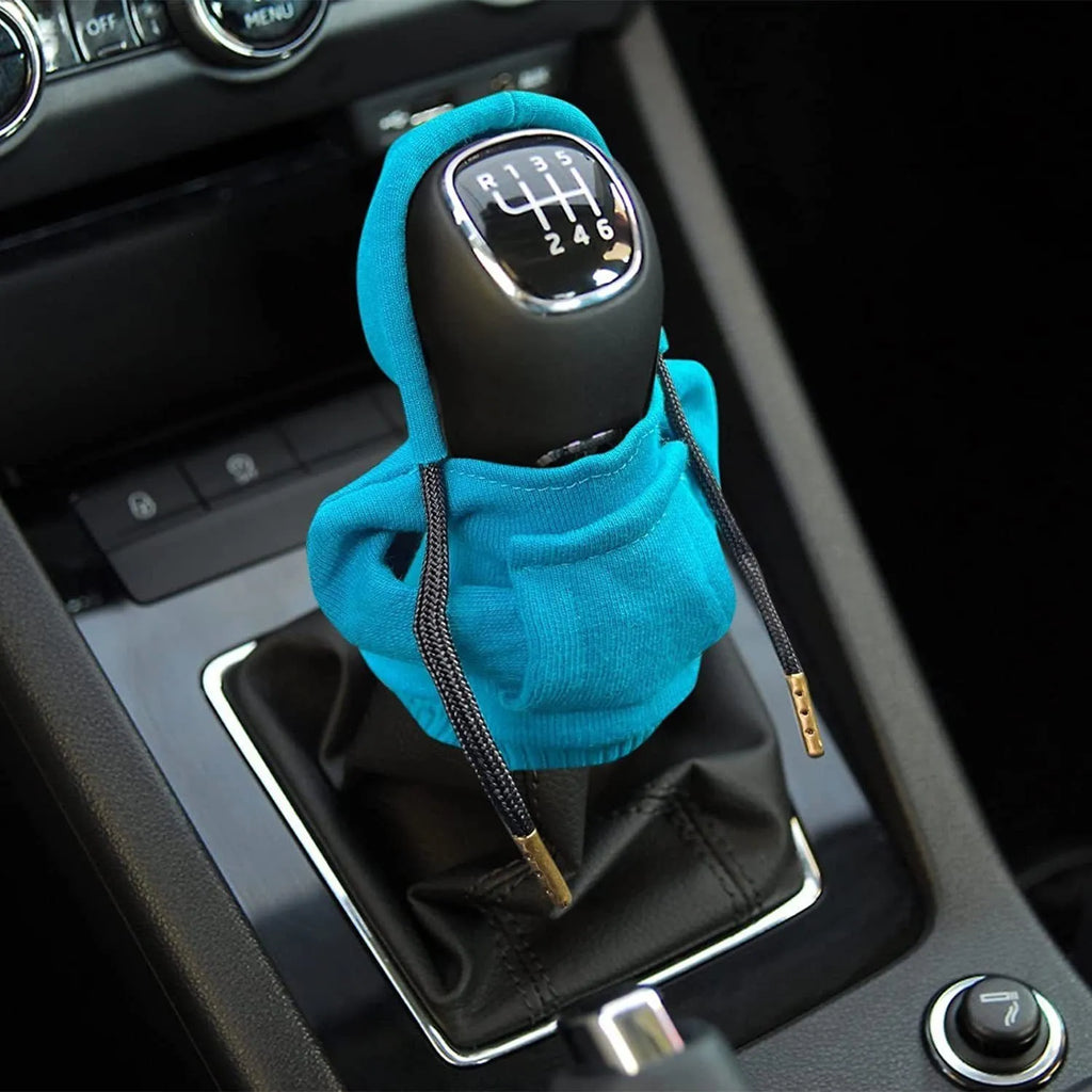 Cloth car gear shift knob cover in various colours showing 13cm by 8cm dimensions