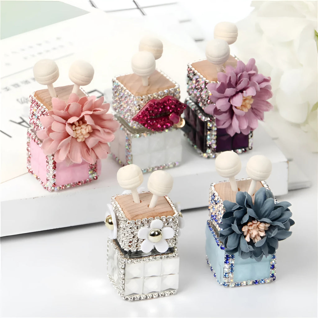 Car flower outlet perfume air freshener in white colour clipped to vehicle air vent, 3.2cm x 7cm size